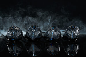 All 4 Paradym Ai Smoke Driver Heads lined up on a black background with smoke billowing behind them