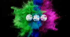3 Golf Balls on Black, Green, Blue and Pink Ink Splatter Background