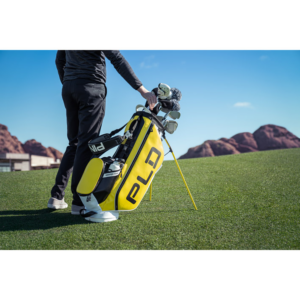 PING PLD Hoofer Stand Bag in yellow white and black on golf course