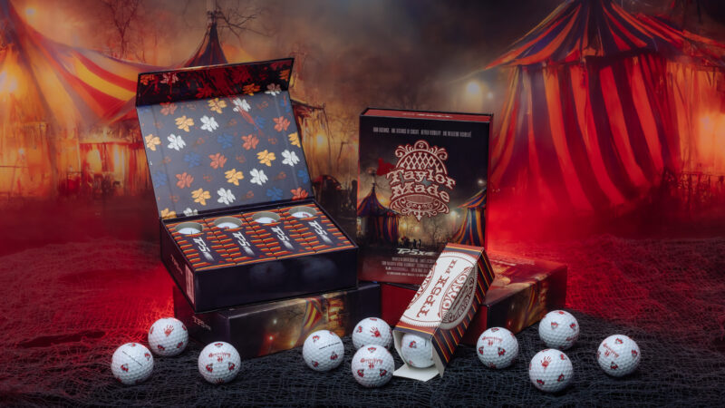 TaylorMade TP5 Nightmare Circus collection of golf balls with circus tents in background