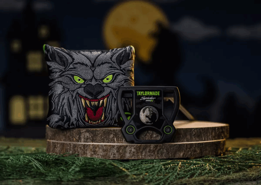 The Midnight Howl Spider Tour X putter and headcover. It features a werewolf silhouetted against a full moon. The TaylorMade logo looks like it is written in green goo.